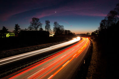 Light trails on road at night