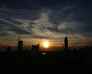 Silhouette of buildings at sunset