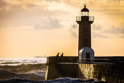 View of lighthouse at sunset