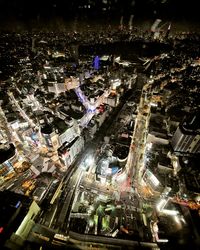 High angle view of illuminated city street at night