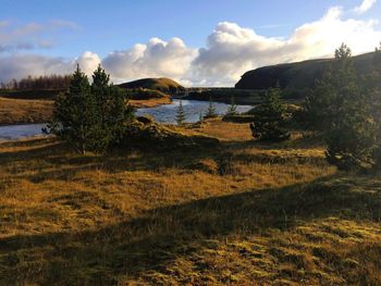 Scenic view of river against sky