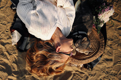 High angle view of woman relaxing outdoors