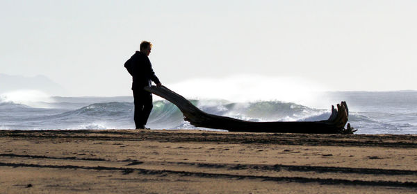 Side view of a man on beach