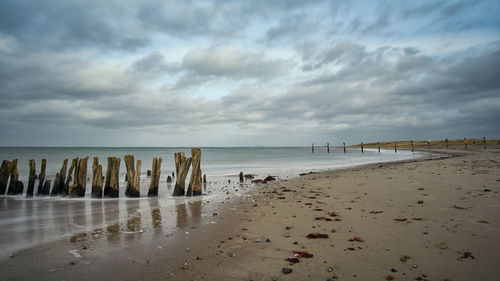 Scenic view of beach against sky