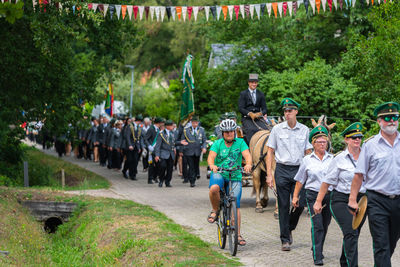 Group of people on bicycle in city