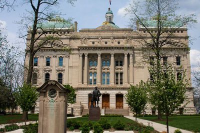 Facade of historic building against sky