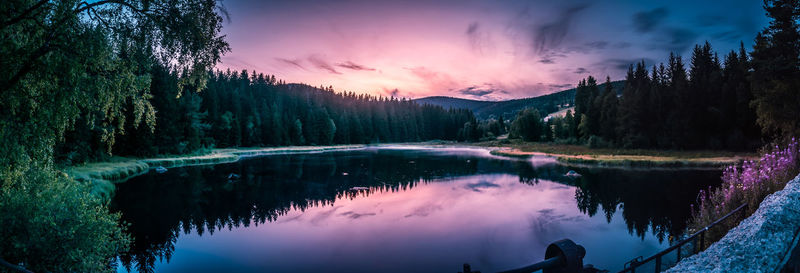 Panoramic view of lake against sky during sunset