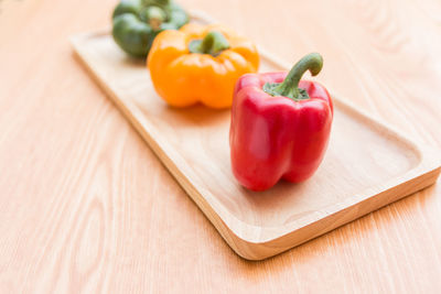 Close-up of bell peppers on cutting board