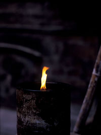 Close-up of burning candle