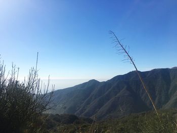 Scenic view of mountains against clear sky