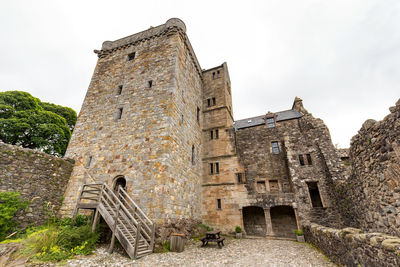 Low angle view of historical building against sky