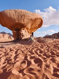 Rock formations in desert against sky