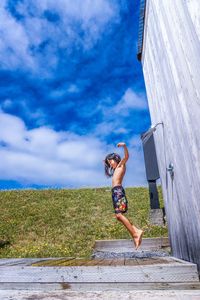 Full length of woman jumping