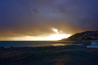 Scenic view of sea against sky during sunset