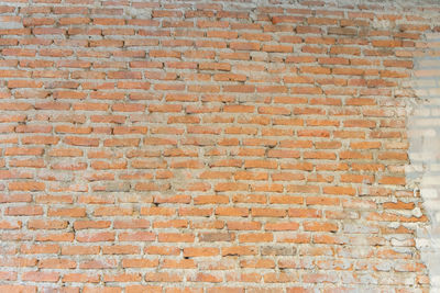 Low angle view of brick wall