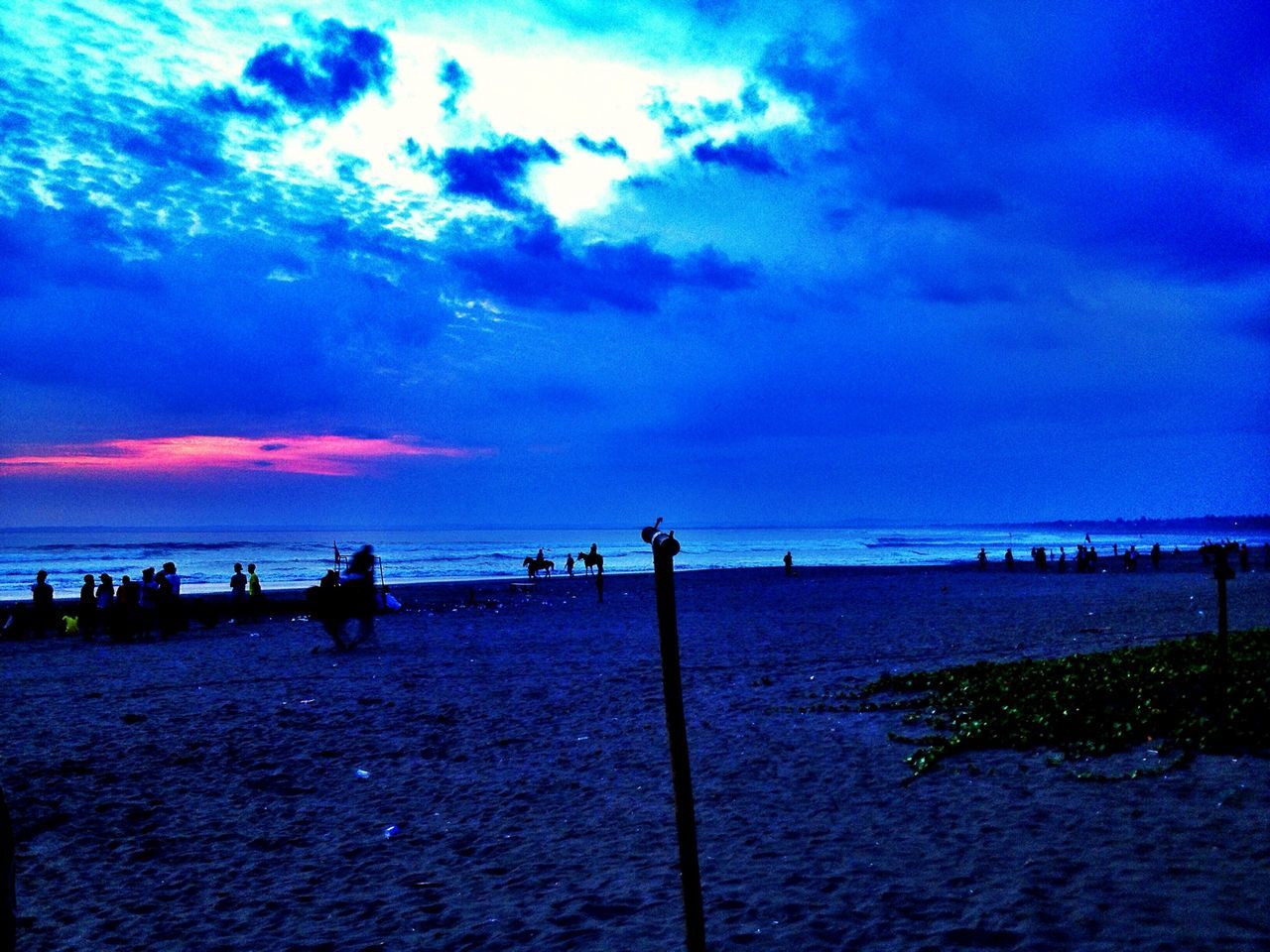 sea, horizon over water, water, beach, sky, scenics, tranquil scene, tranquility, beauty in nature, sunset, shore, nature, idyllic, cloud - sky, blue, sand, incidental people, cloud, vacations, pier