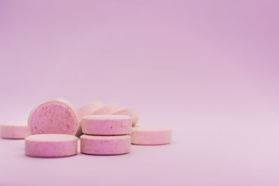 Close-up of pills against white background
