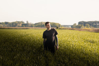 Man standing in field