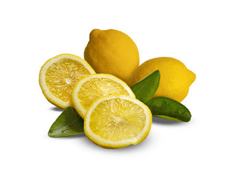 Close-up of lemon slice against white background