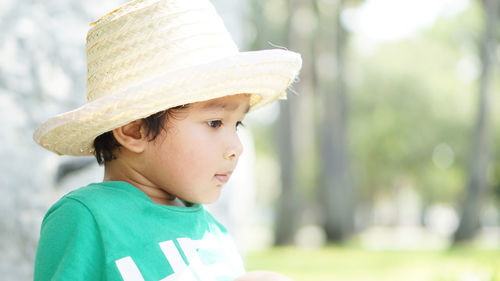 Portrait of cute boy looking away