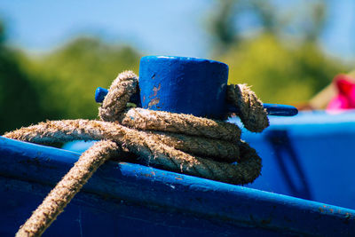 Close-up of rope tied on metal