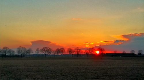 Scenic view of landscape at sunset