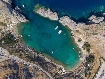 Top view of bay with azure sea, highlands on summer.