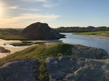 Scenic view of land against sky