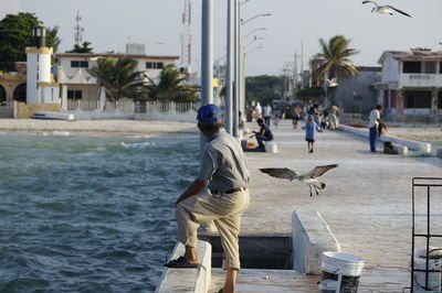 Man working at town square