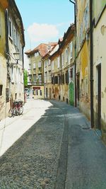 Narrow alley with buildings in background