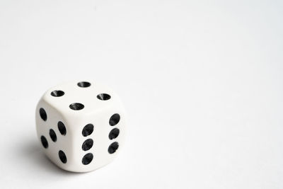 Close-up of coins on white background