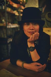 Portrait of woman wearing hat