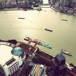 High angle view of boats moored at harbor