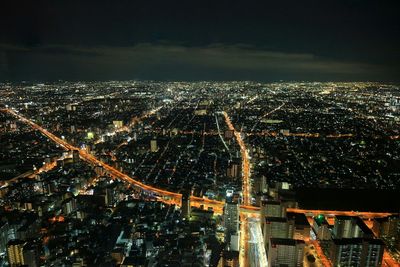 Aerial view of city at night