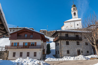 Historic village of sauris di sotto in the snow. winter dream. italy