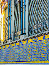 Low angle view of text on building