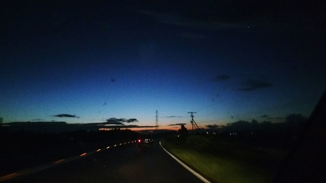 transportation, road, sky, car, silhouette, no people, night, illuminated, outdoors, road sign, nature