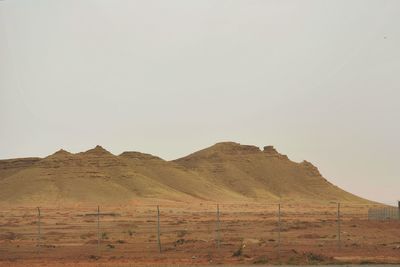 Scenic view of desert against sky