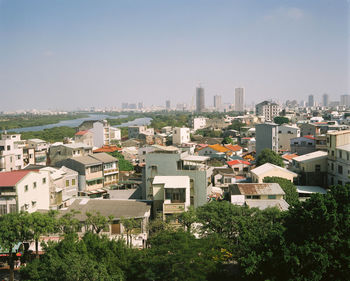 High angle shot of townscape against clear sky