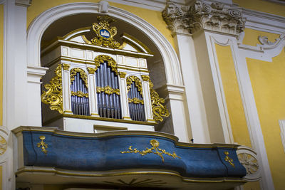 Low angle view of cross in building