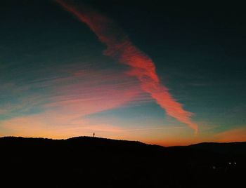 Scenic view of mountains at sunset