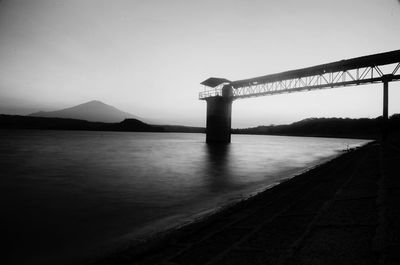 Bridge over river against sky