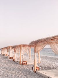 Scenic view of beach against clear sky