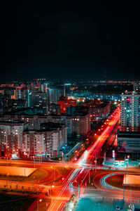 High angle view of illuminated city at night 