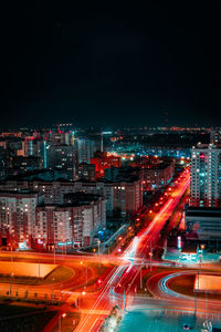 High angle view of illuminated city at night