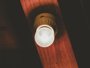 Low angle view of illuminated light bulb