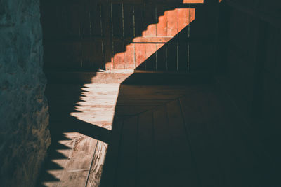 High angle view of staircase by wall