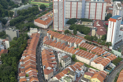 High angle view of street amidst buildings in town