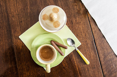 High angle view of coffee cup on table