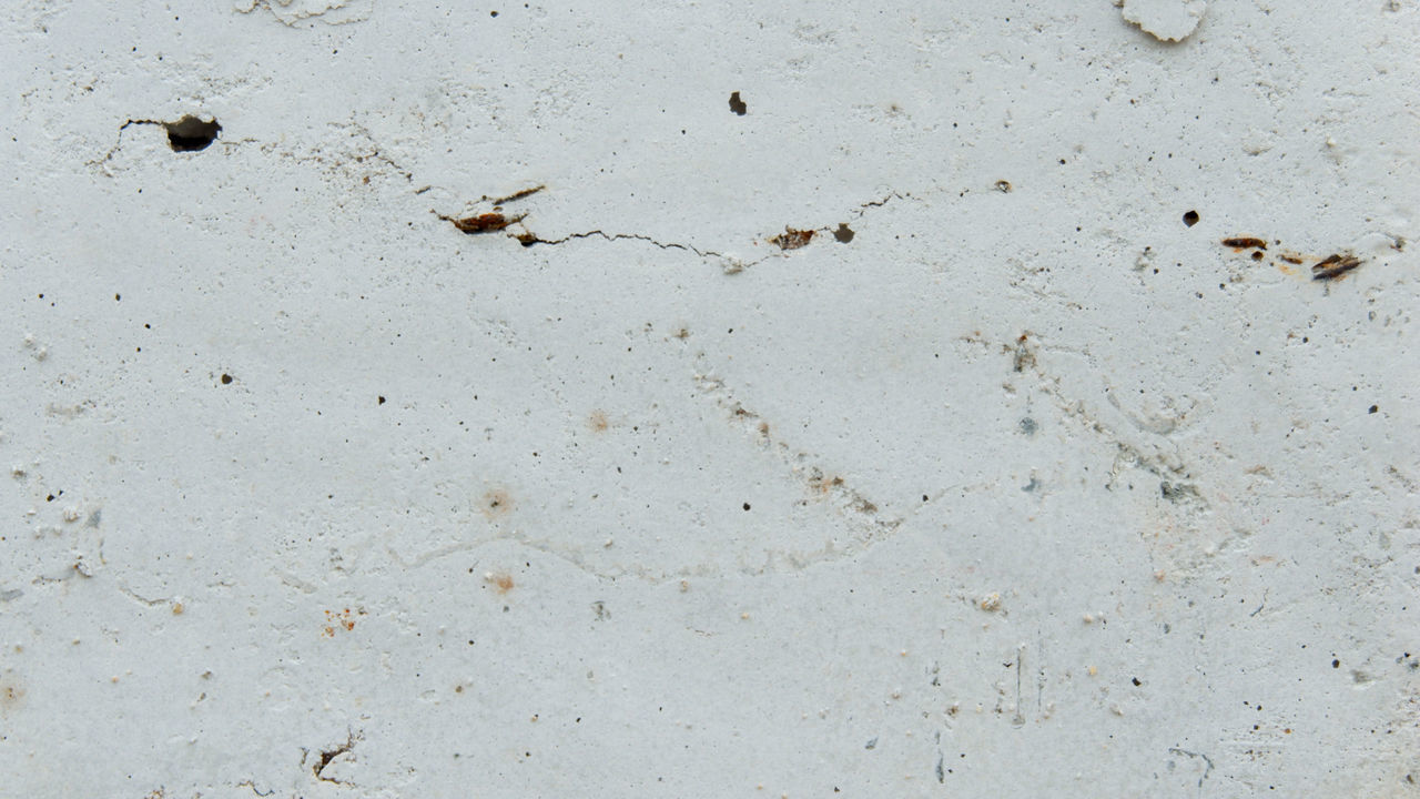 backgrounds, full frame, no people, textured, wall - building feature, built structure, wall, floor, pattern, architecture, day, weathered, close-up, white, nature, outdoors, sand, rough, gray, dirt, concrete, old